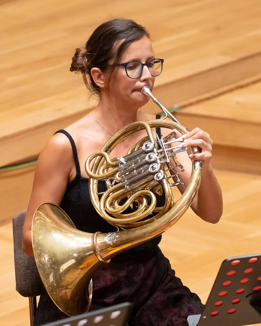 Gabriela Tomova, french horn, performing at Homecoming in Bulgaria Hall